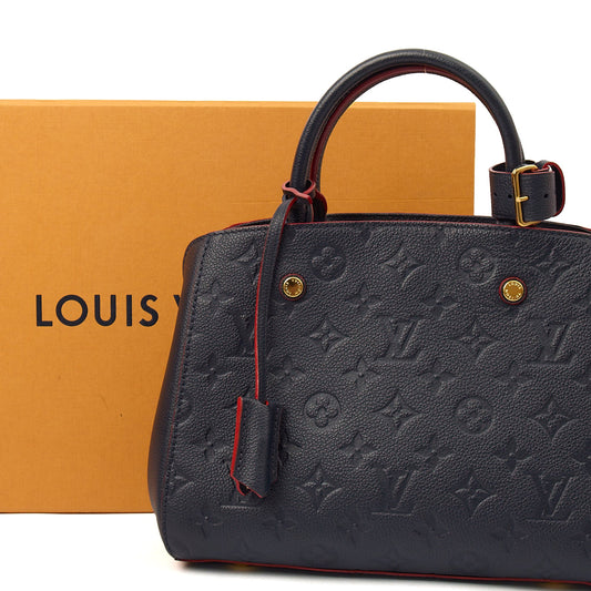 Louis Vuitton Cross Body Montaigne BB in Blue, Empreinte Leather — Side View