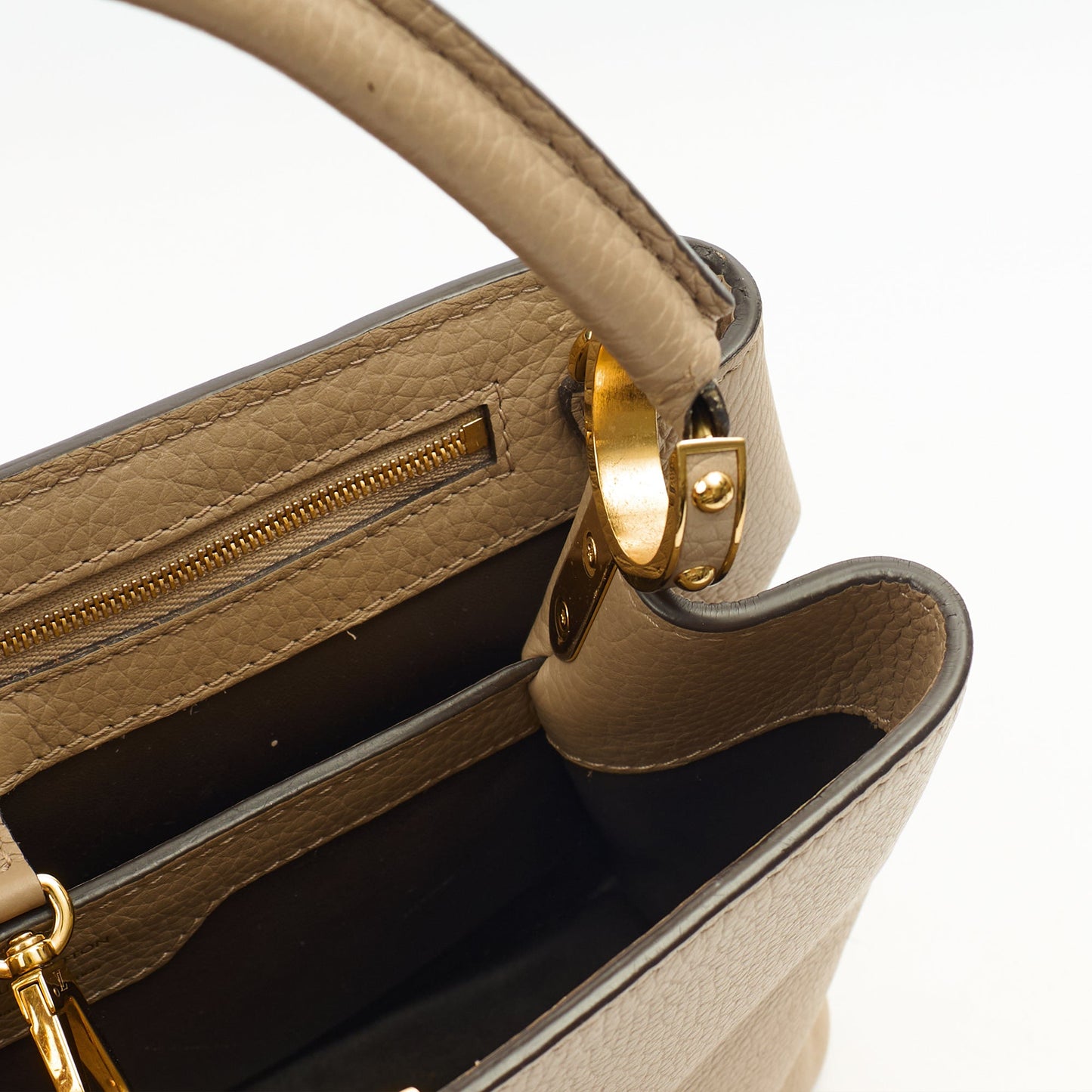Louis Vuitton Top Handle Capucines MM in Galet, Taurillon Leather — Lifestyle View