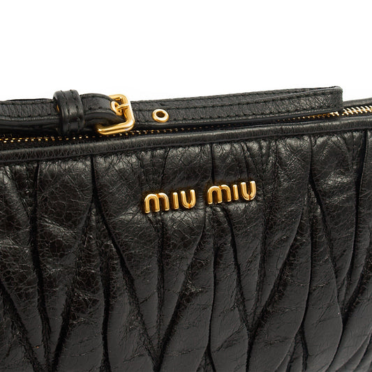 Miu Miu Clutch Matelasse Clutch in Black, Exotic Effect Leather — Side View