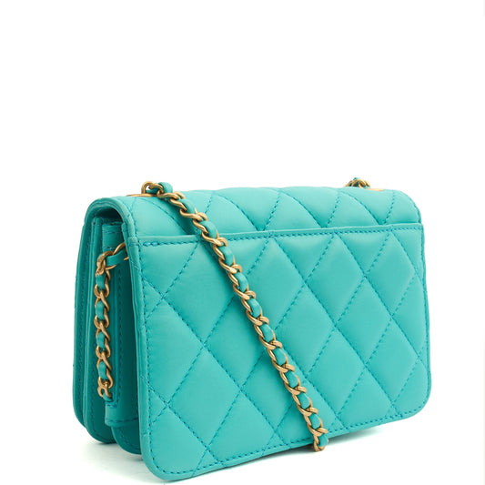Chanel Cross Body Quilted Flap Bag Mini in Blue, Calfskin Leather — Side View