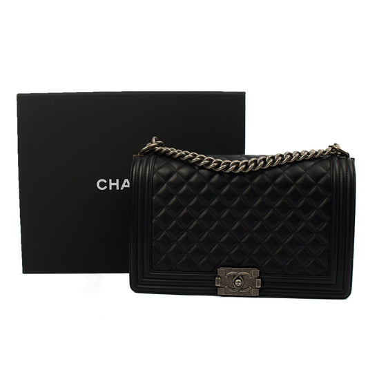 Chanel Shoulder Bag Boy - Large in Black, Lambskin Leather — Side View