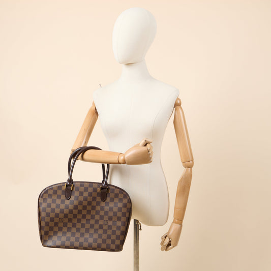 Louis Vuitton Top Handle Saria in Damier Ebene, Canvas — Side View