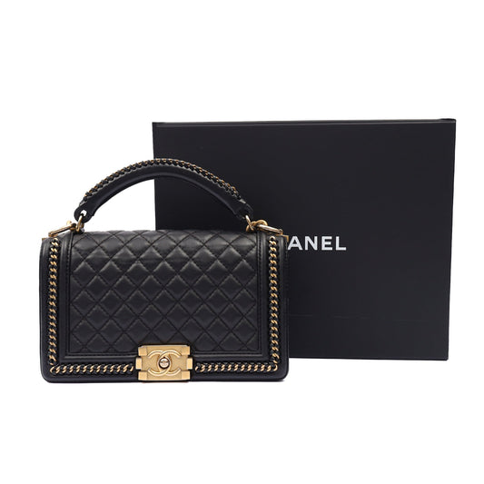 Chanel Shoulder Bag Boy Top Handle - Medium in Black, Calfskin Leather — Side View