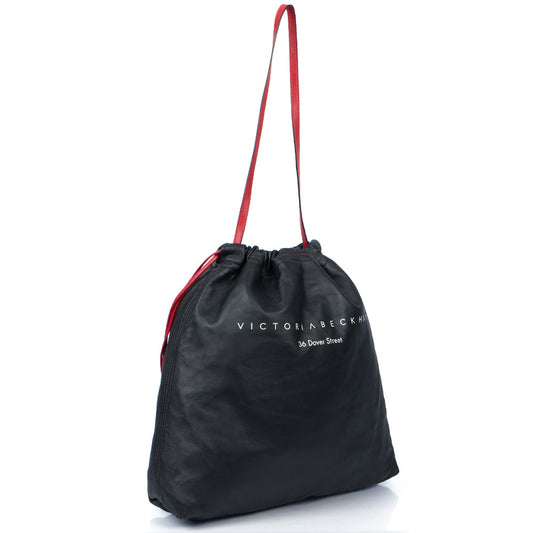Victoria Beckham Tote Drawstring Bucket Bag in Black, Leather — Side View
