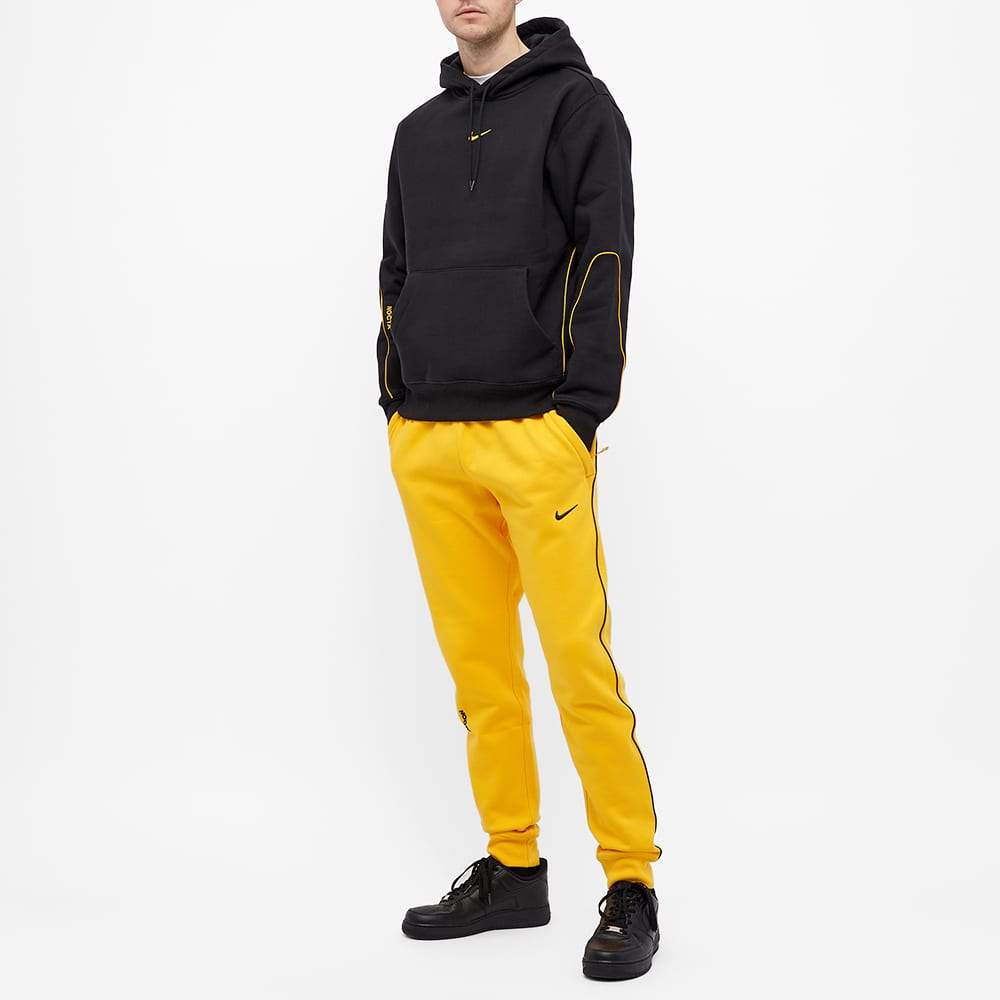 Drake x Nike NOCTA AU Essential Fleece Pant University Gold — XXS — Lifestyle View
