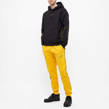 Drake x Nike NOCTA AU Essential Fleece Pant University Gold — XXS — Lifestyle View