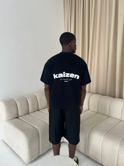 KAIZEN MARKET ARCH TEE BLACK — XS — Top View