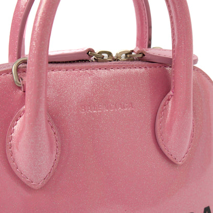 Balenciaga Cross Body Ville Top Handle XXS in Pink, Patent Leather — Lifestyle View