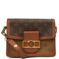 Louis Vuitton Cross Body Dauphine MM Bag in Reverse Monogram, Canvas — Front View
