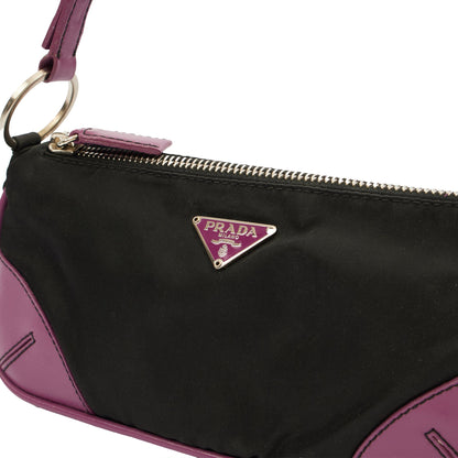 Prada Mini Bag Nylon Pochette in Black, Denim — Lifestyle View