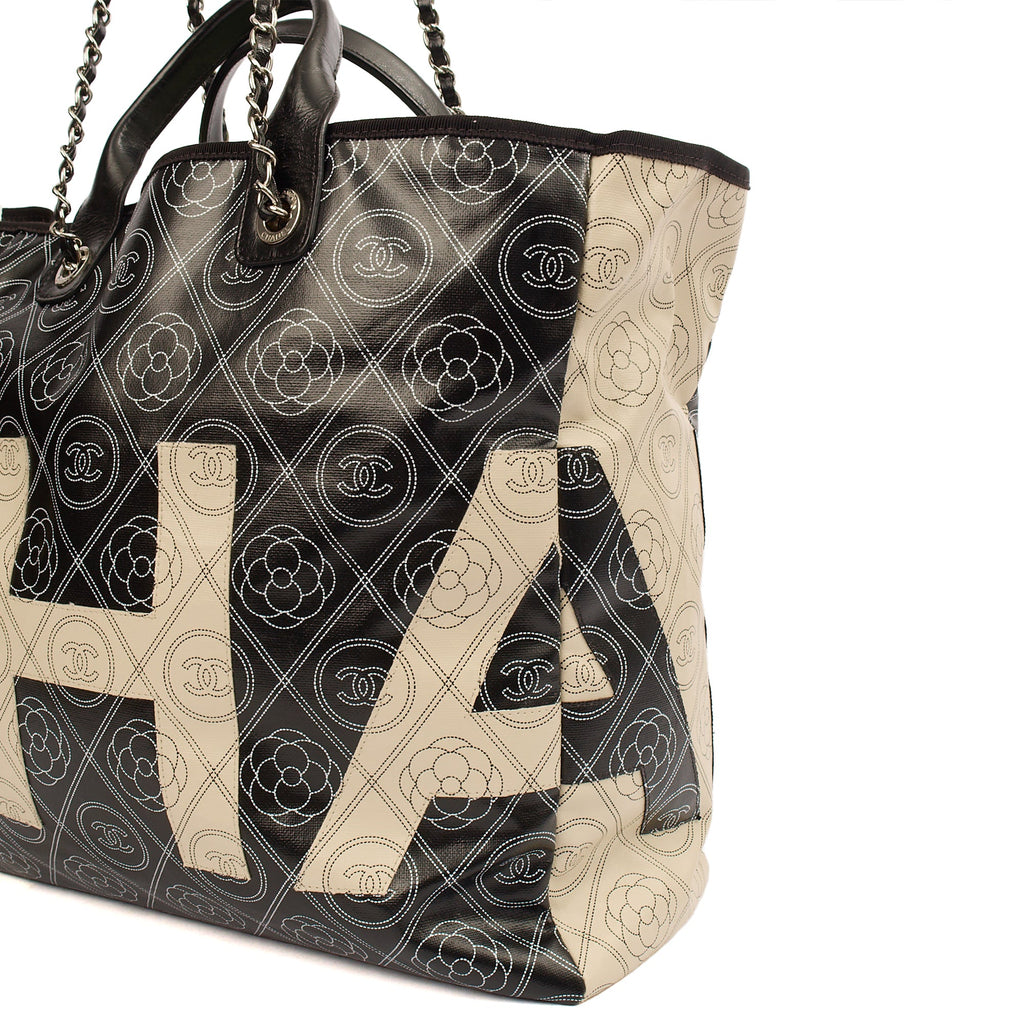 **RUNWAY PIECE** Chanel Camelia Shopping Tote in Calfskin Leather — Lifestyle View