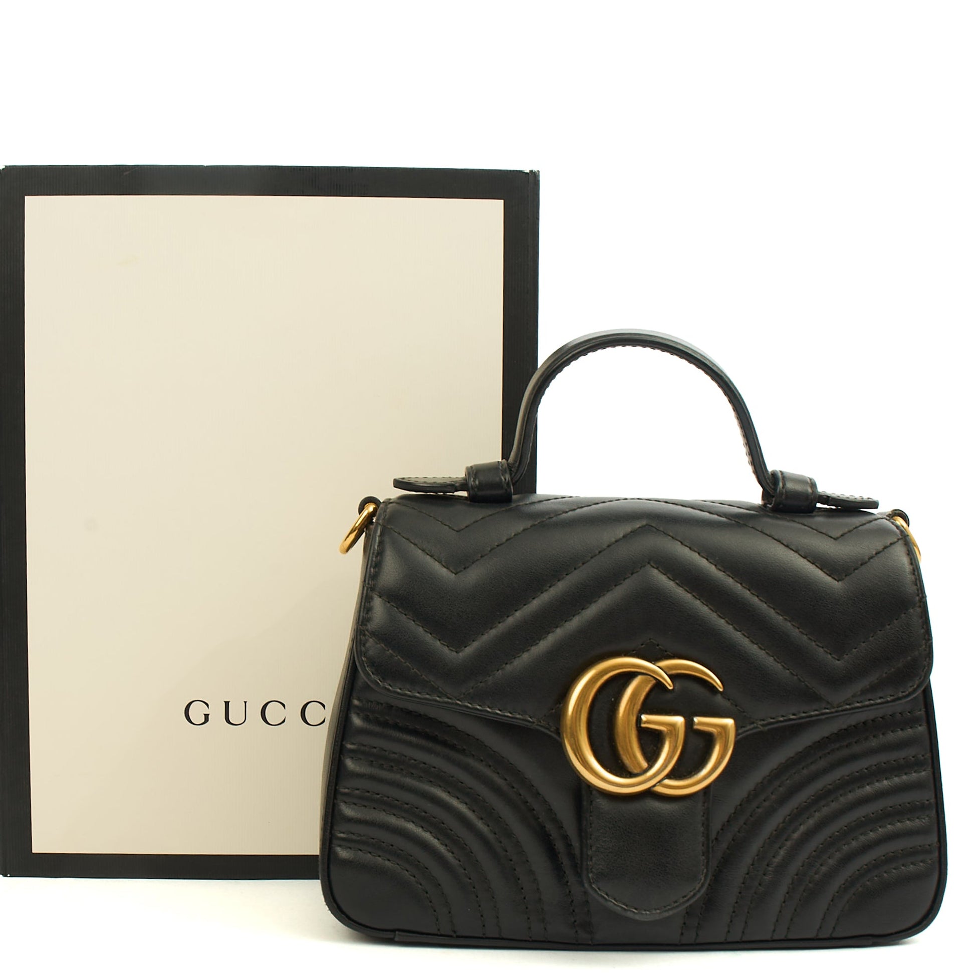 Gucci Top Handle GG Marmont Top Handle - Mini in Black, Leather — Lifestyle View