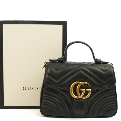 Gucci Top Handle GG Marmont Top Handle - Mini in Black, Leather — Lifestyle View