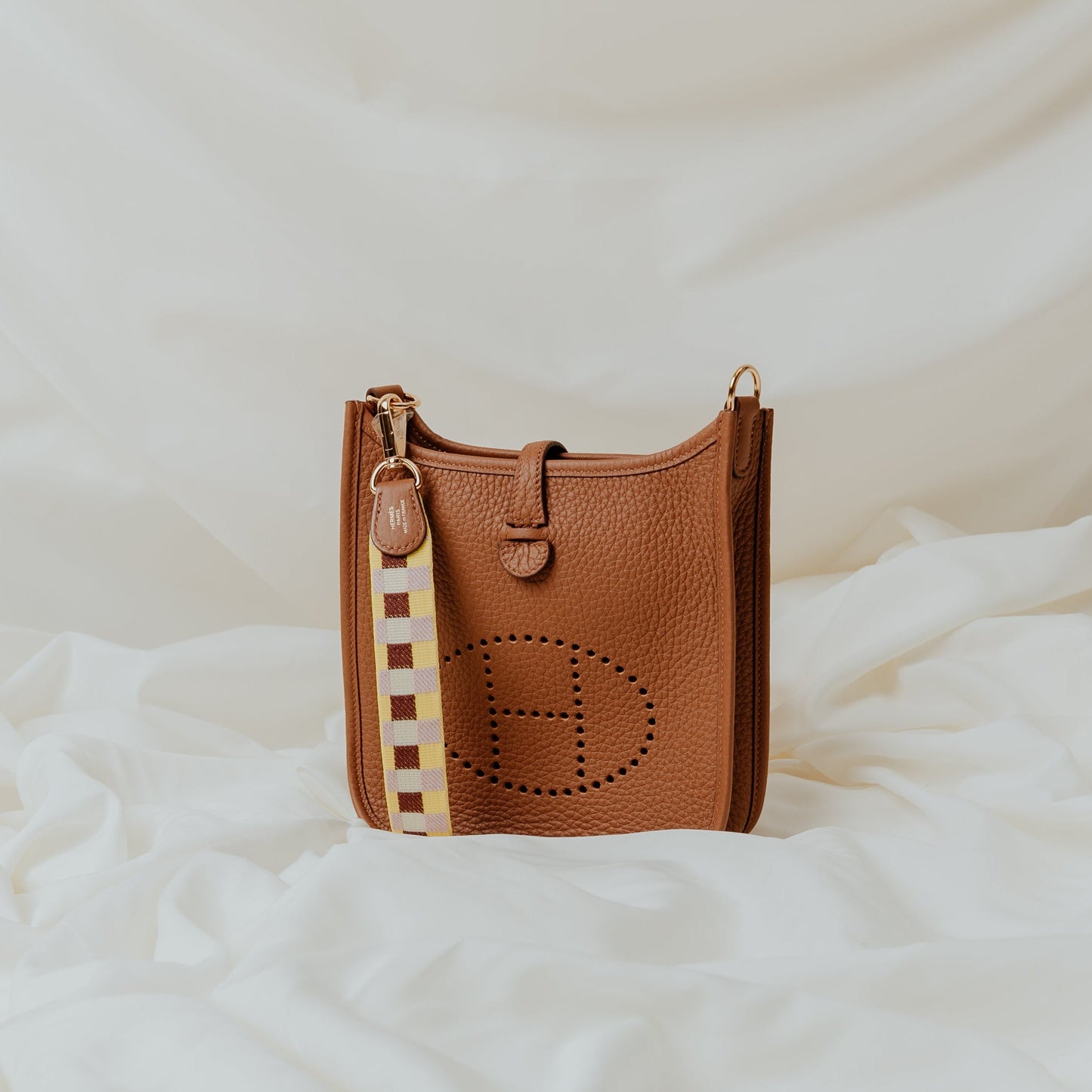 Hermes Evelyne 16 in Gold, Togo Leather — Side View