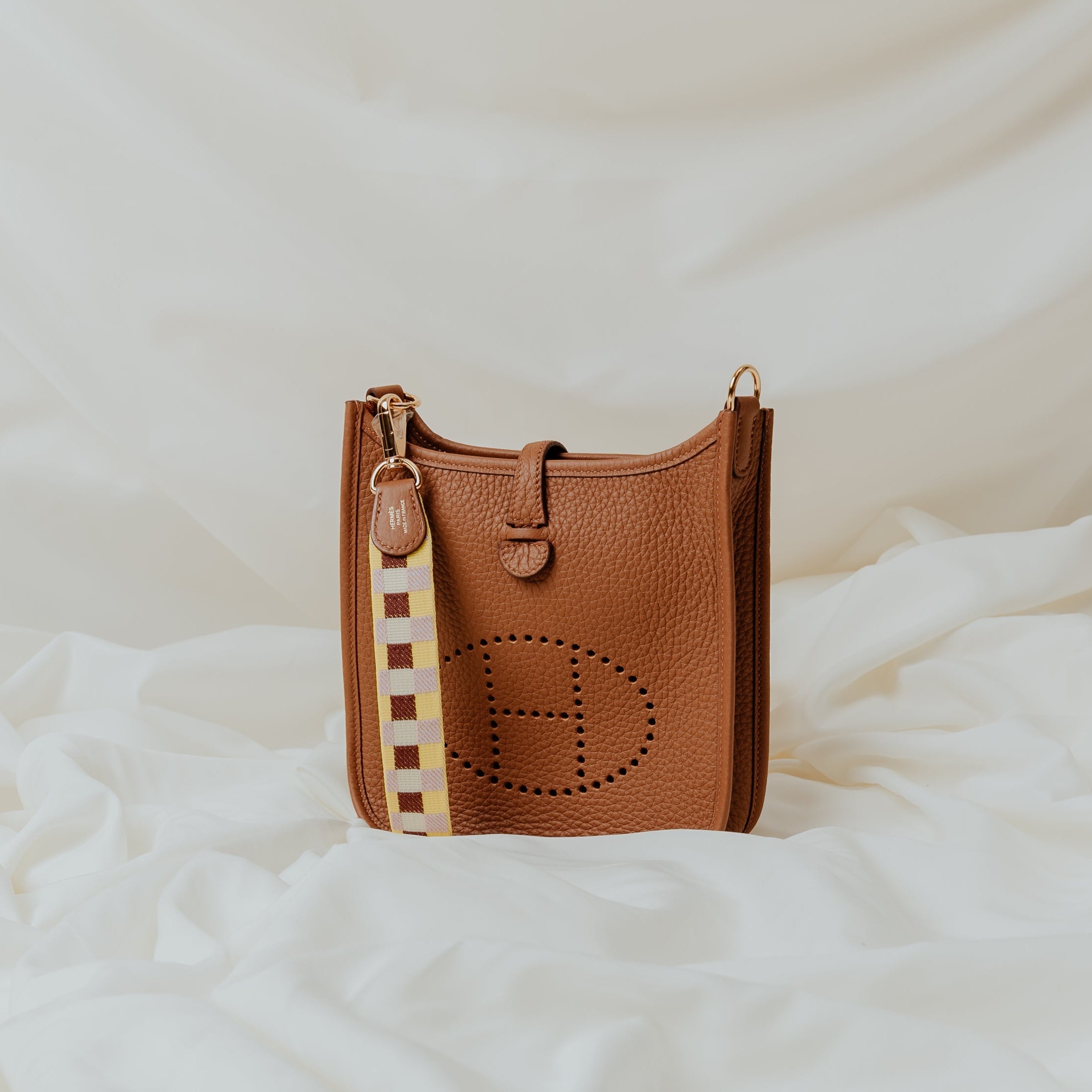 Hermes Evelyne 16 in Gold, Togo Leather — Side View