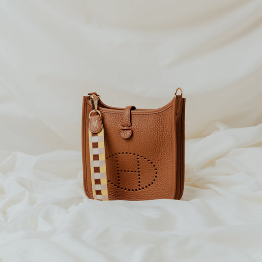 Hermes Evelyne 16 in Gold, Togo Leather — Side View