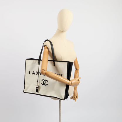 Chanel Tote Ladies First Shopping Tote in White, Canvas — Back View