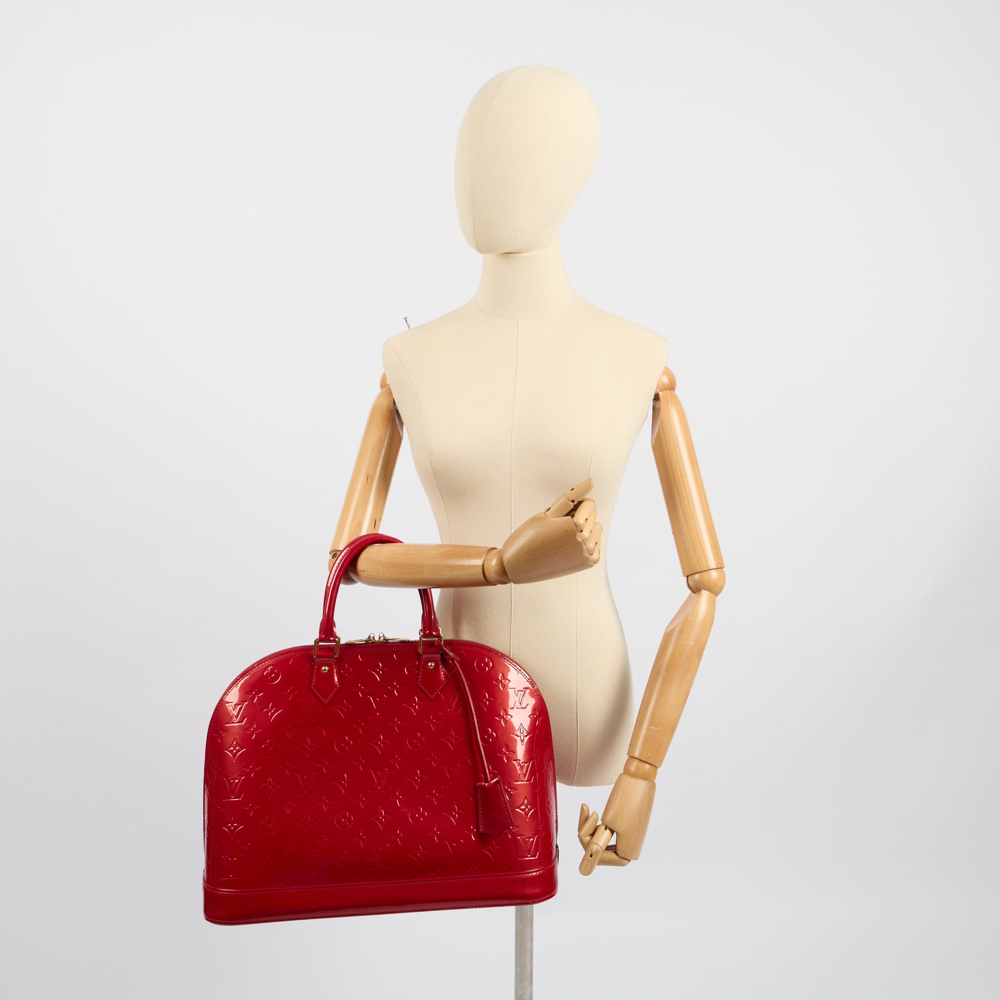 Louis Vuitton Top Handle Alma GM in Monogram, Vernis — Side View