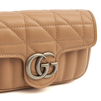 Gucci Mini Bag Marmont Shoulder Flap Bag - Super Mini in Neutral, Leather — Lifestyle View
