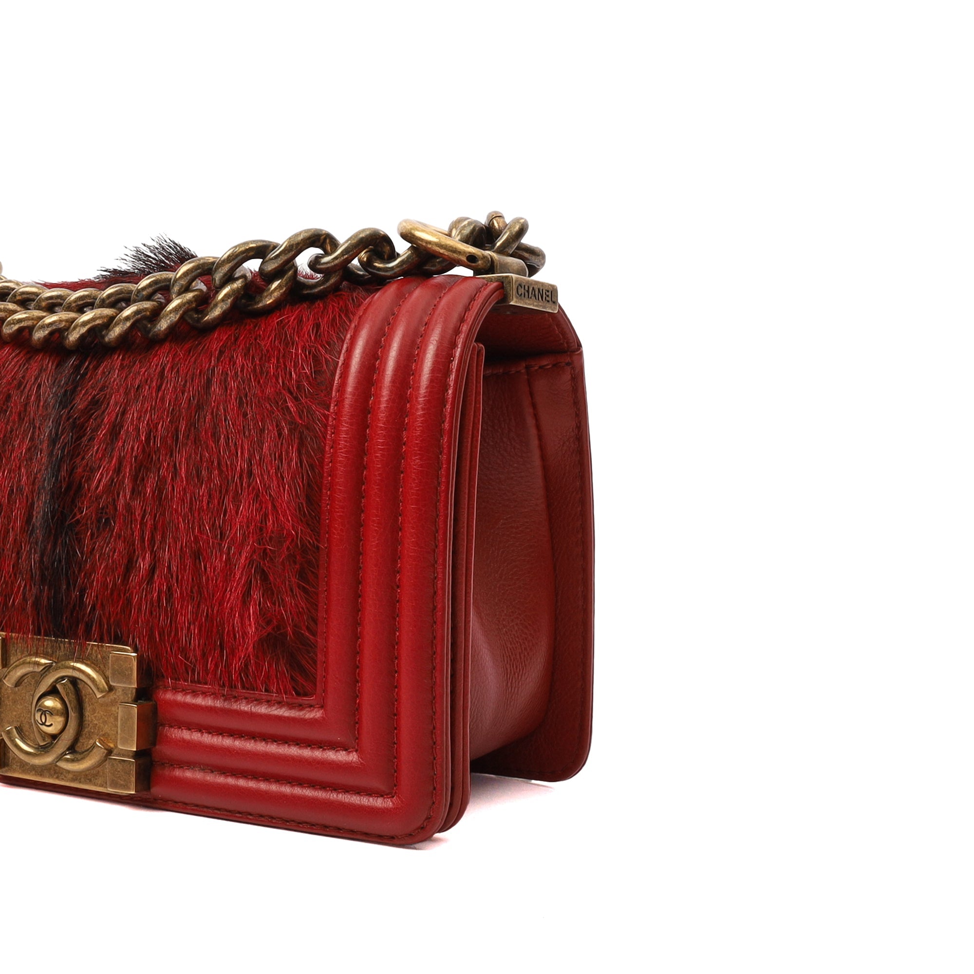 Chanel Shoulder Bag Boy - Small in Red, Calfskin Leather — Lifestyle View
