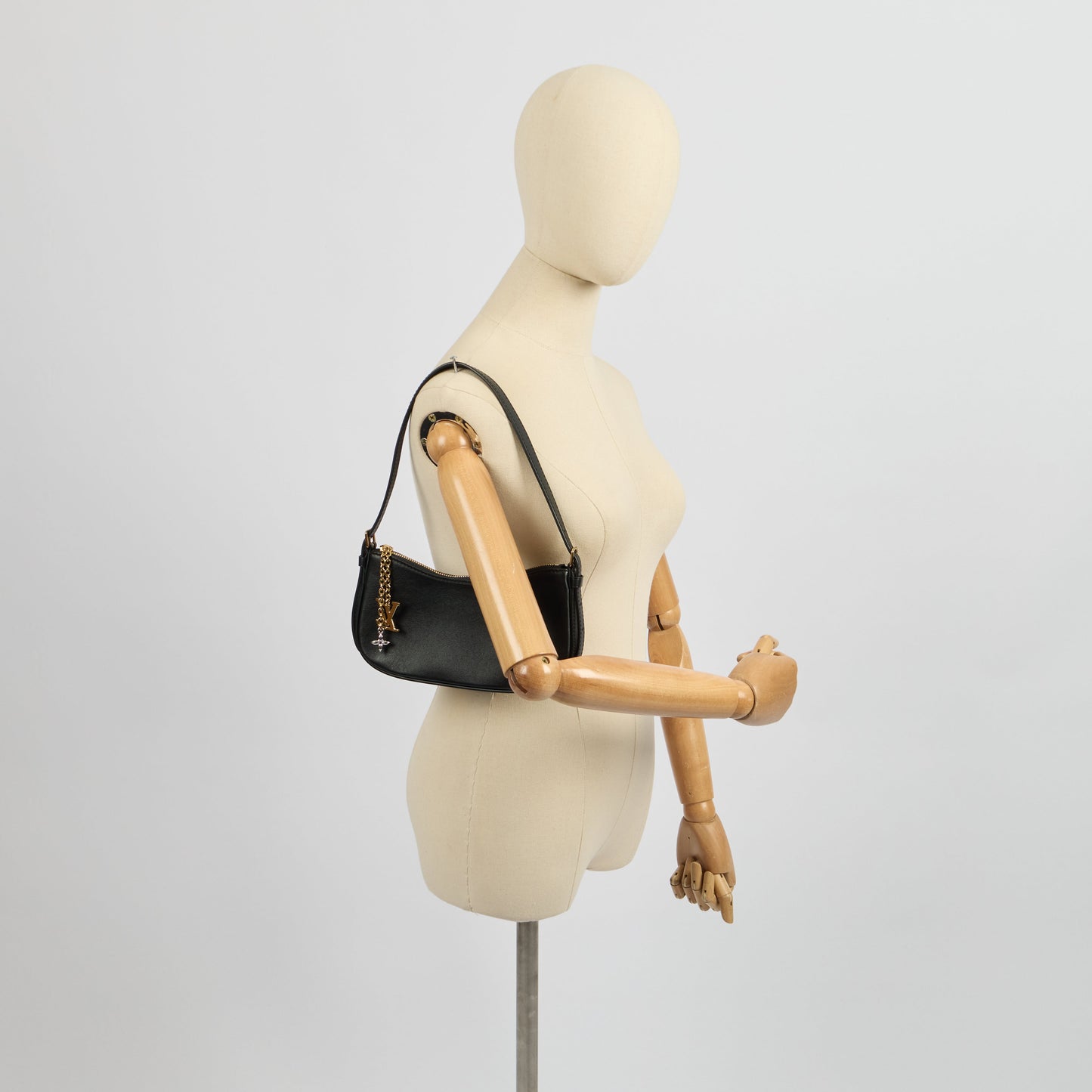 Louis Vuitton Shoulder Bag Bloom Pochette in Black, Leather — Lifestyle View