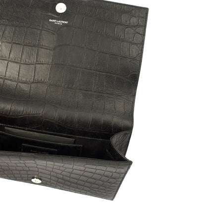 Saint Laurent Clutch Cassandra Clutch in Black, Exotic Effect Leather — Detail View