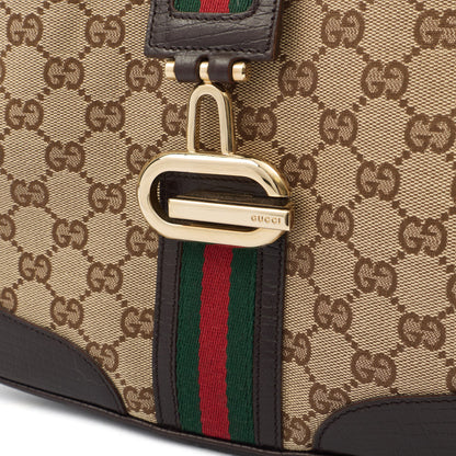 Gucci Shoulder Bag Jackie in Brown, GG Canvas — Lifestyle View