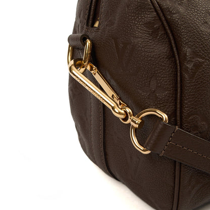 Louis Vuitton Top Handle Speedy Bandouliere 30 in Monogram, Empreinte Leather — Lifestyle View