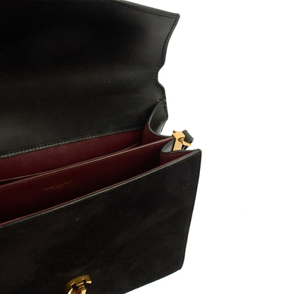 Saint Laurent Top Handle Cassandra Top Handle - Medium in Black, Leather — Lifestyle View
