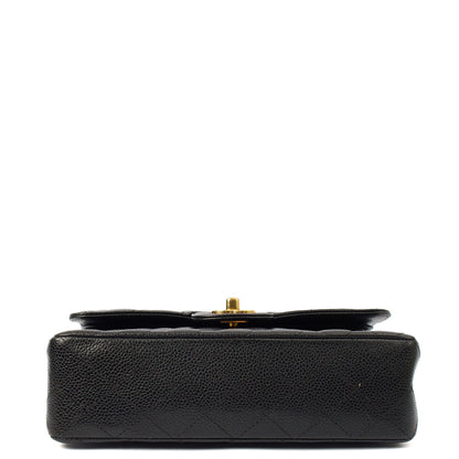 Chanel Shoulder Bag Classic Double Flap - Small in Black, Caviar Leather — Lifestyle View