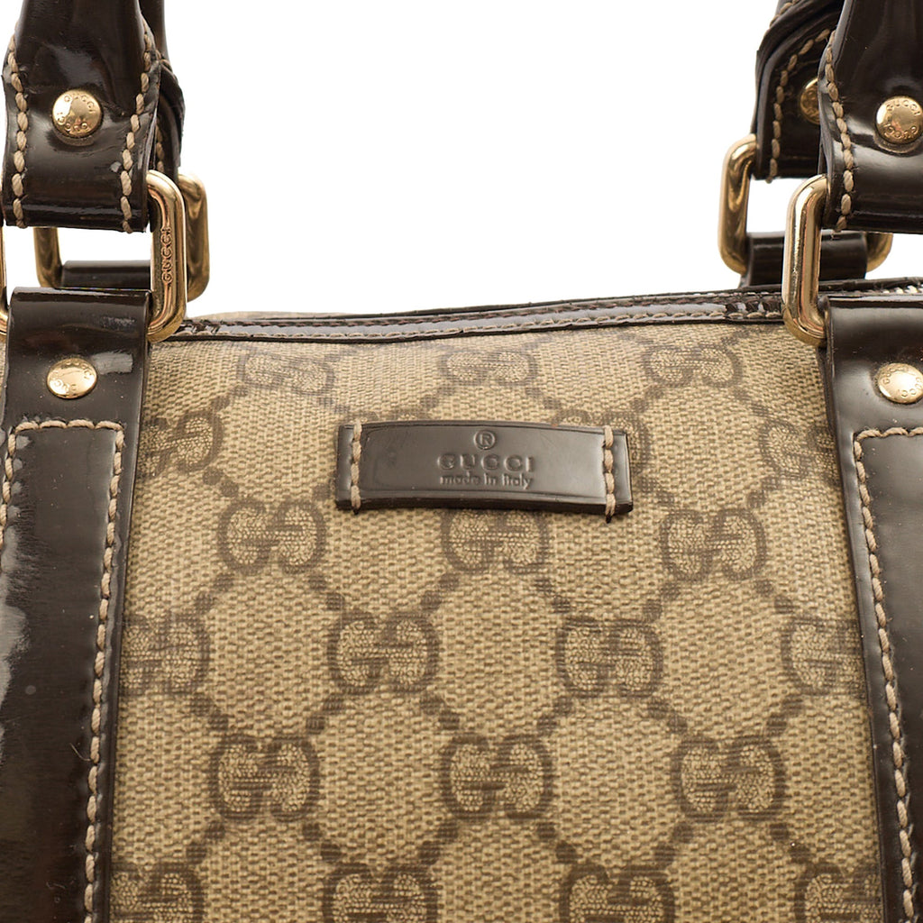 Gucci Top Handle Boston in GG Supreme, Leather — Lifestyle View
