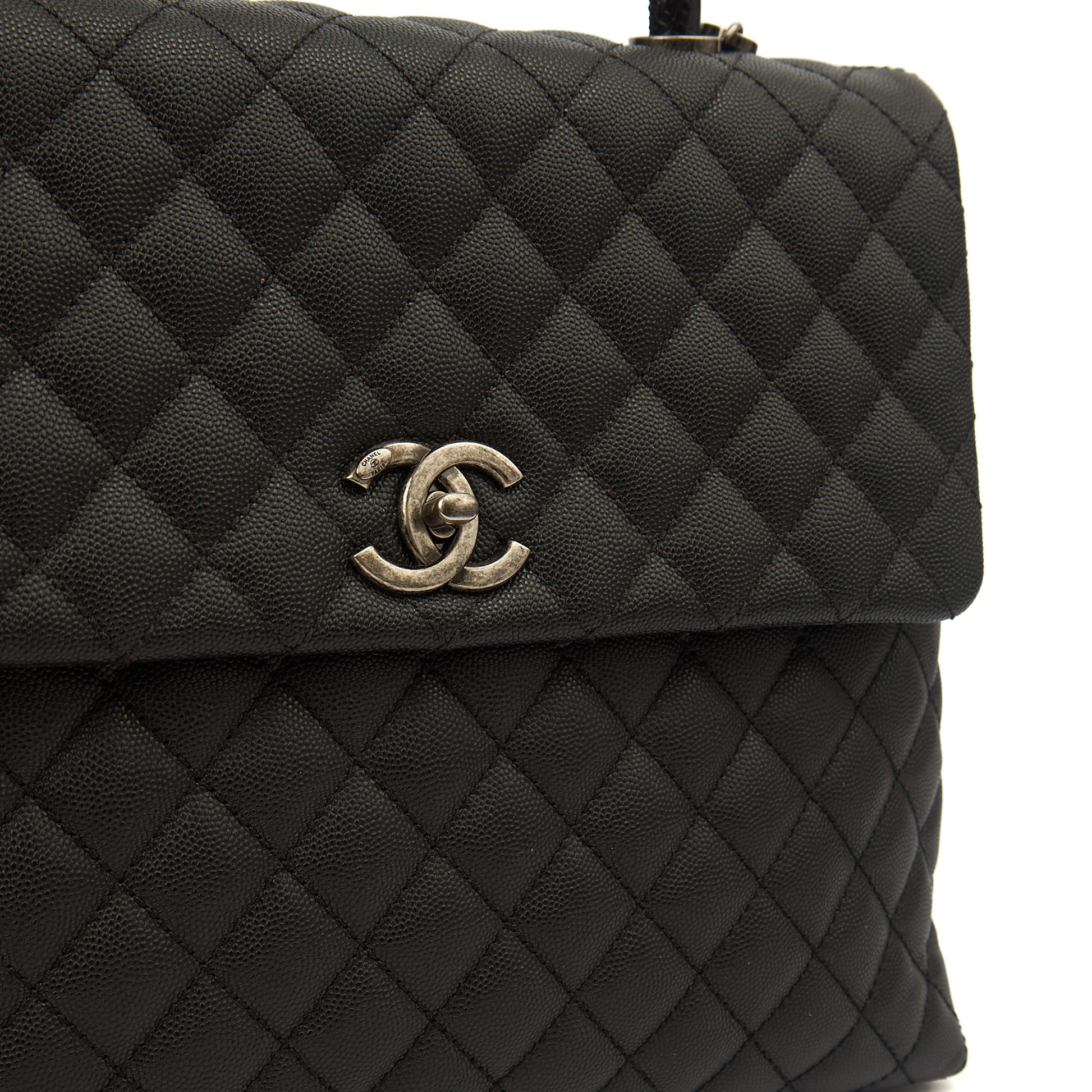 Chanel Tote Coco Top Handle in Black, Caviar Leather — Lifestyle View