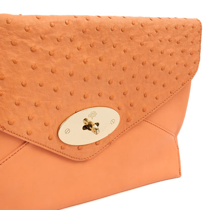 Mulberry Clutch Pouch in Coral Orange, Calfskin Leather — Lifestyle View