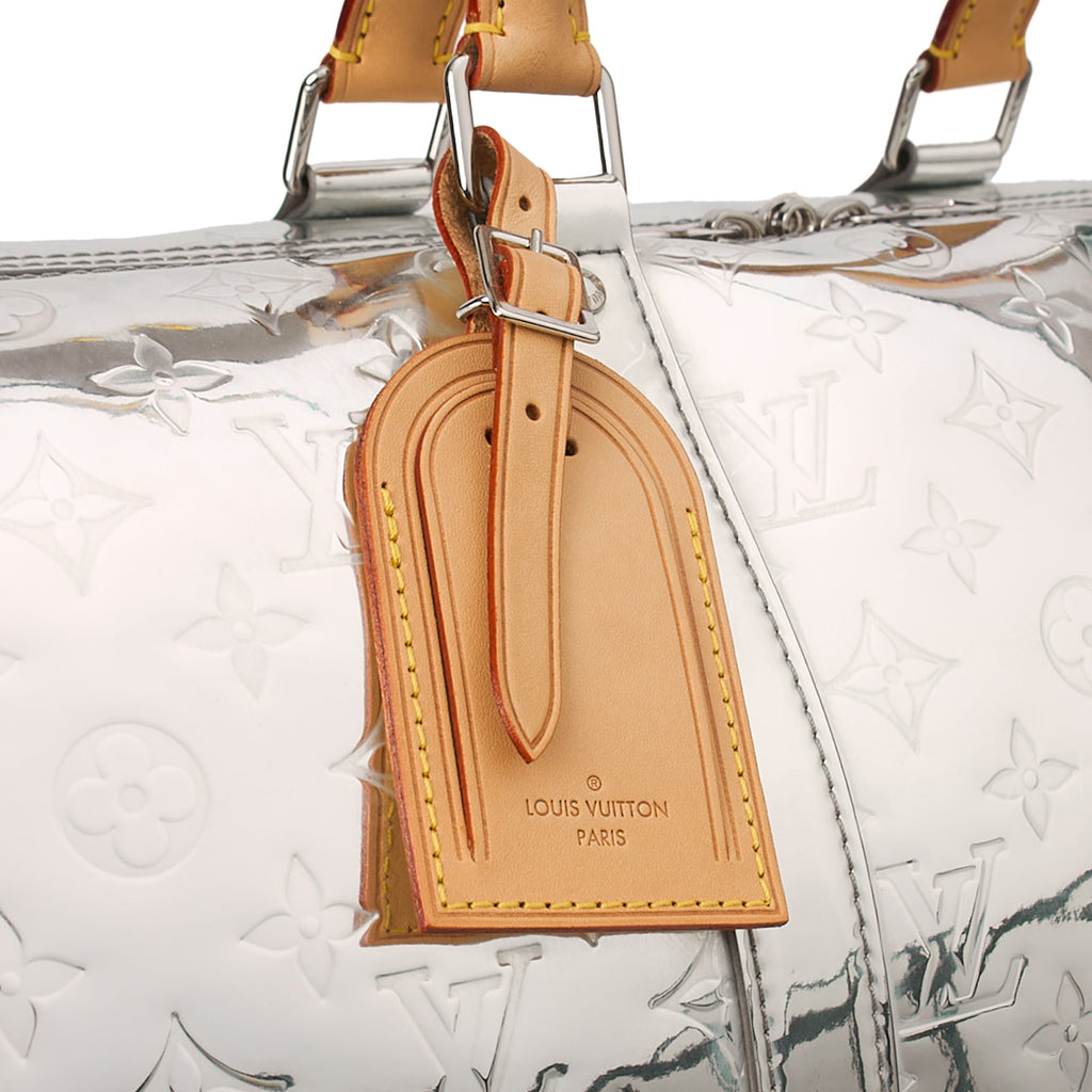 Louis Vuitton Soft Sided Keepall 50 Bandouliere in Metallic, Leather — Lifestyle View