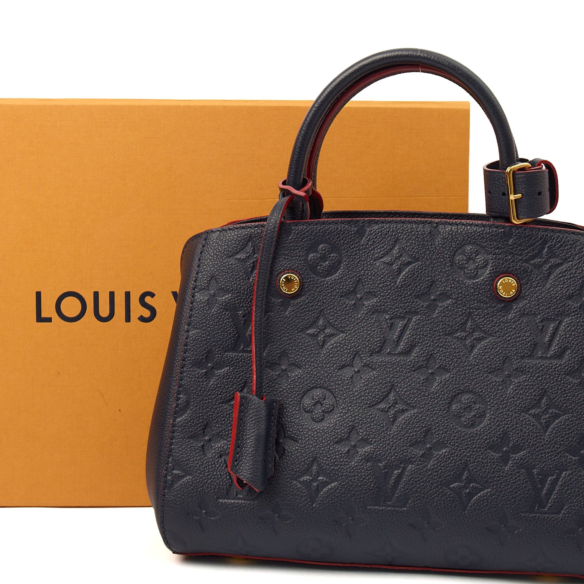 Louis Vuitton Cross Body Montaigne BB in Blue, Empreinte Leather — Side View