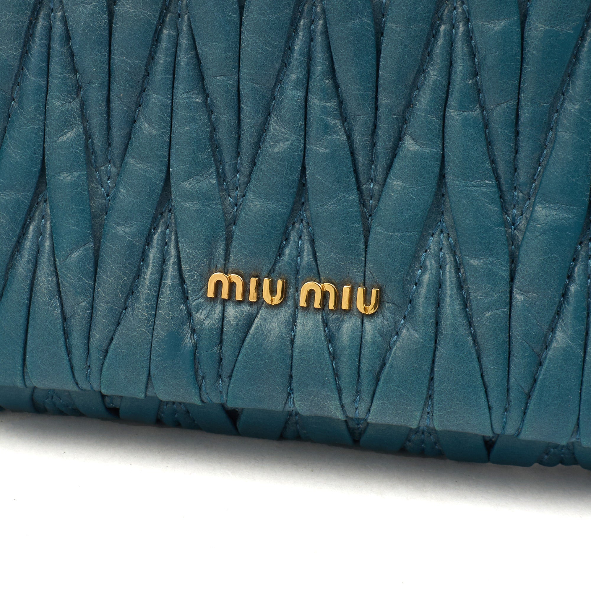 Miu Miu Cross Body Matelasse Crossbody in Blue, Leather — Side View
