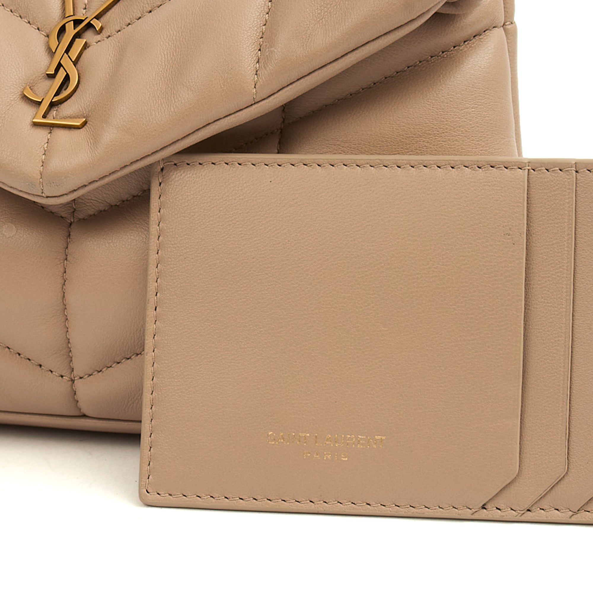 Saint Laurent Cosmetic Bag Puffer Pouch - Small in Neutral, Leather — Lifestyle View