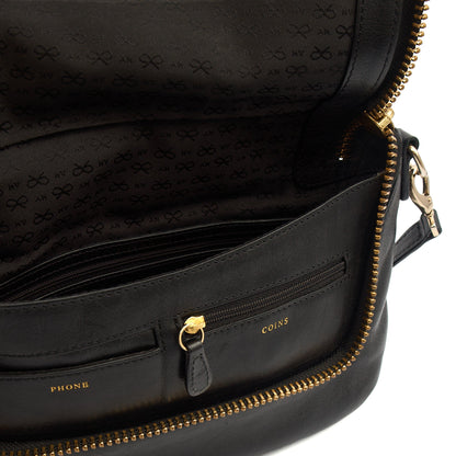 Anya Hindmarch Cross Body Maxi Zip Crossbody in Black, Leather — Lifestyle View