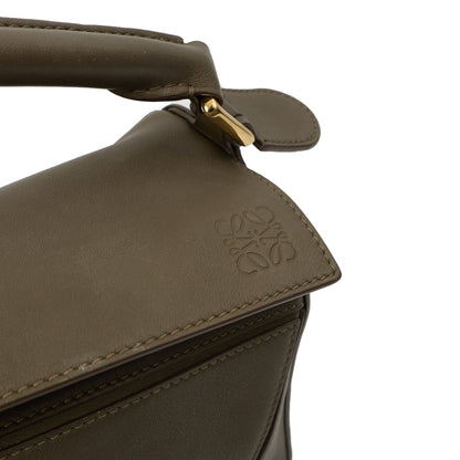 Loewe Top Handle Puzzle - Medium in Green, Leather — Lifestyle View