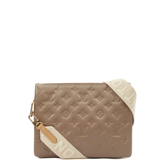 Louis Vuitton Cross Body Coussin PM in Brown, Empreinte Leather — Front View