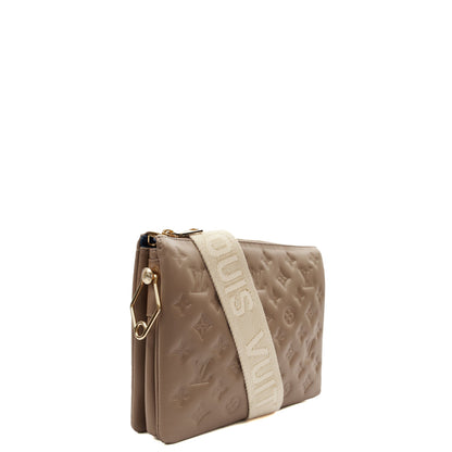 Louis Vuitton Cross Body Coussin PM in Brown, Empreinte Leather — Side View