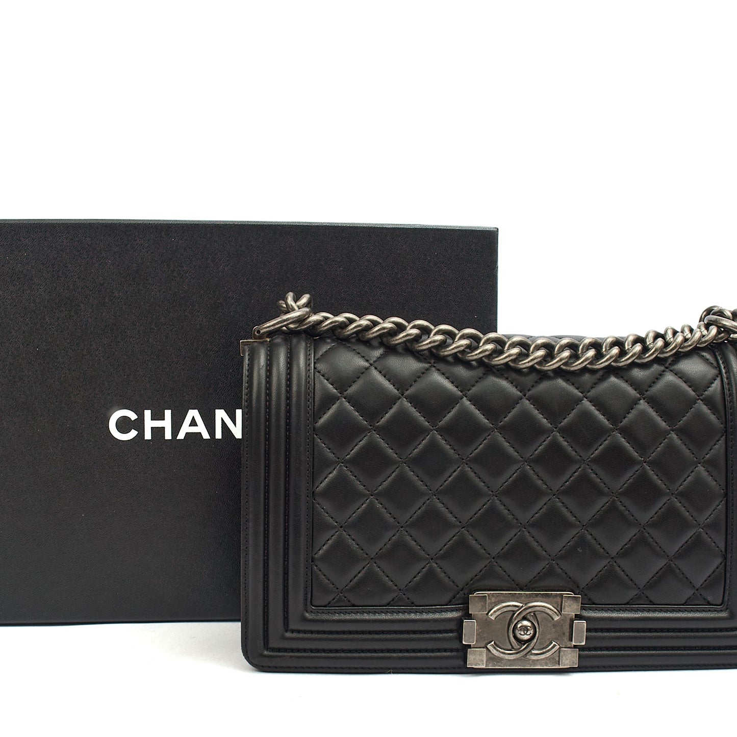 Chanel Shoulder Bag Boy - Medium in Black, Lambskin Leather — Lifestyle View