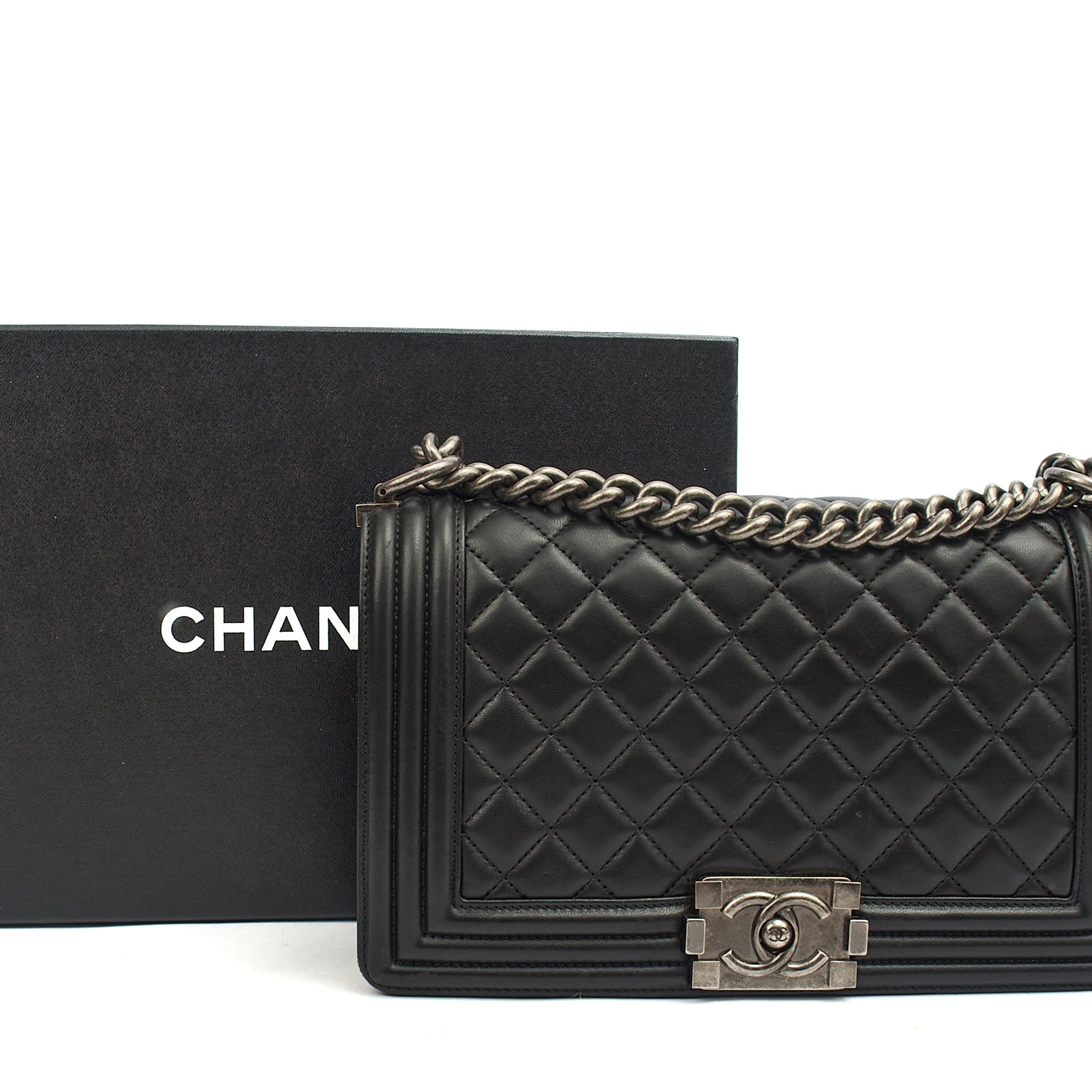 Chanel Shoulder Bag Boy - Medium in Black, Lambskin Leather — Lifestyle View