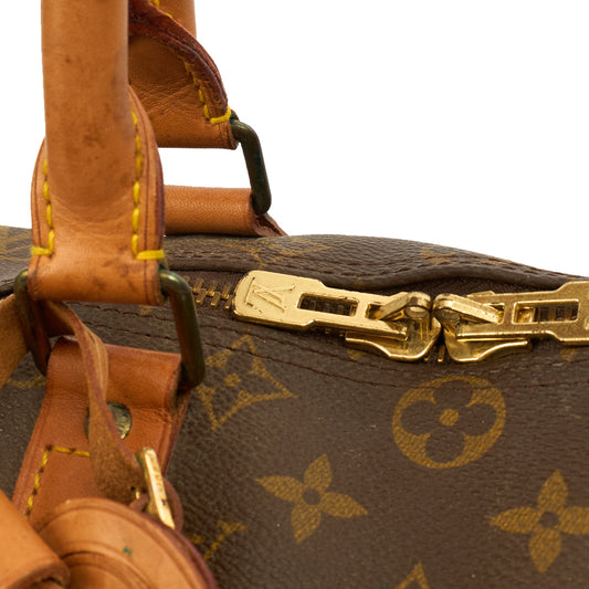 Louis Vuitton Tote Keepall 45 Bandouliere in Monogram, Canvas — Side View