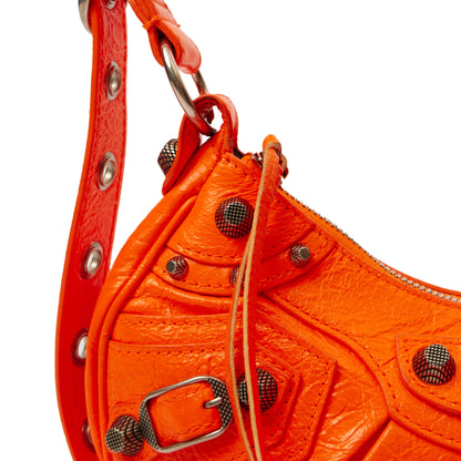 Balenciaga Shoulder Bag Le Cagole S in Orange, Leather — Lifestyle View