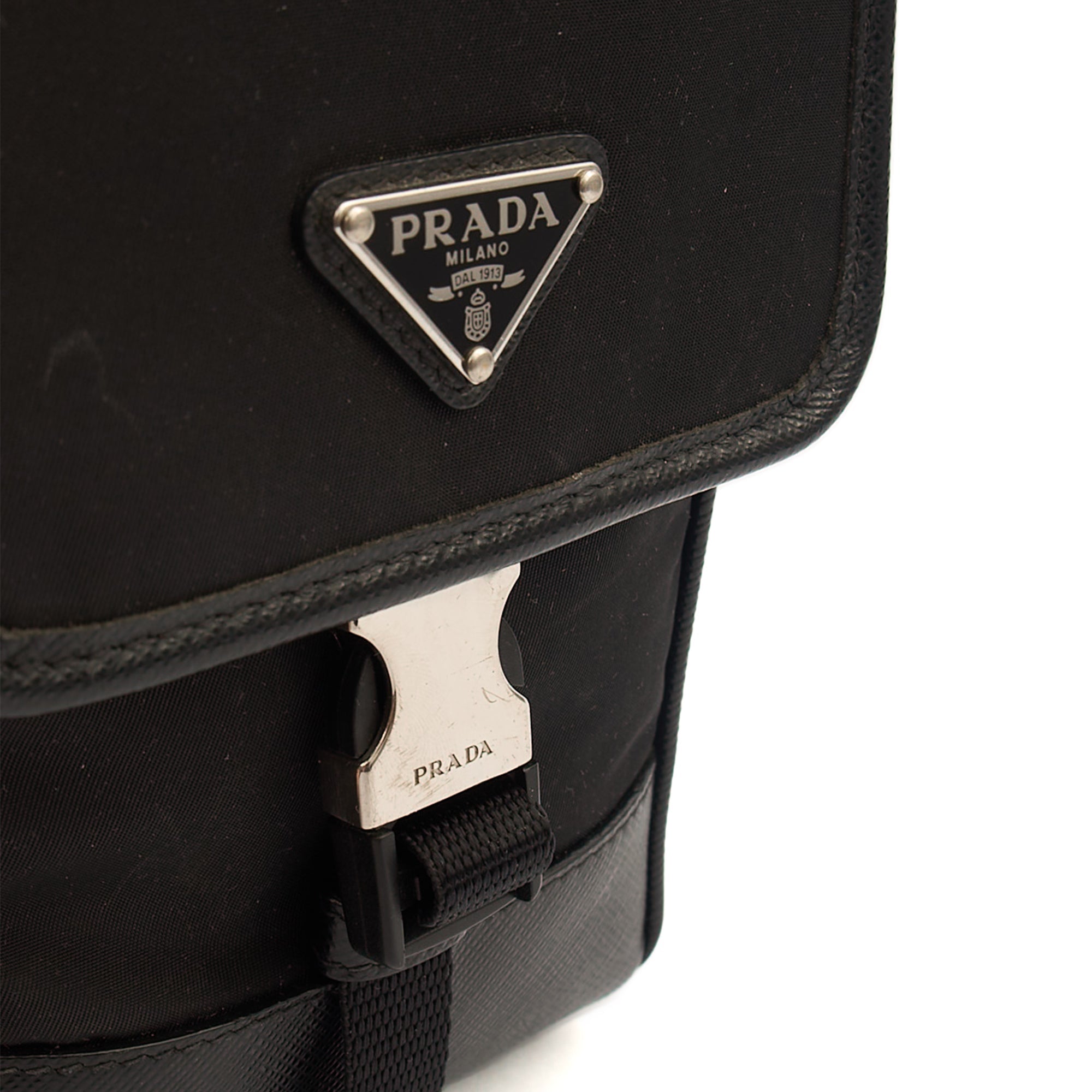 Prada Cross Body Plaque Logo Leather Mini Bag in Black, Nylon — Lifestyle View