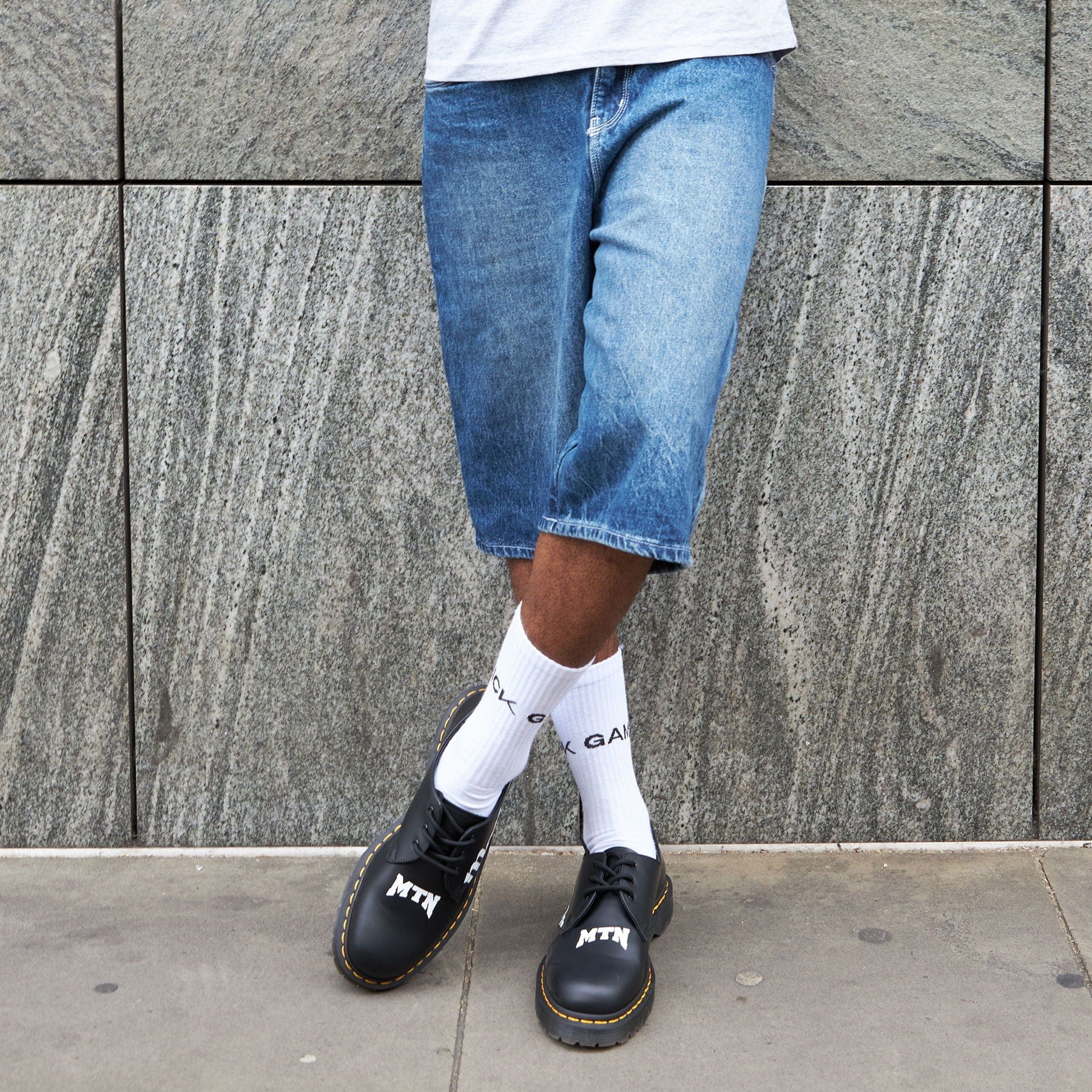 Dr. Martens x Motherlan 1461 'Black' — UK 1 — Back View