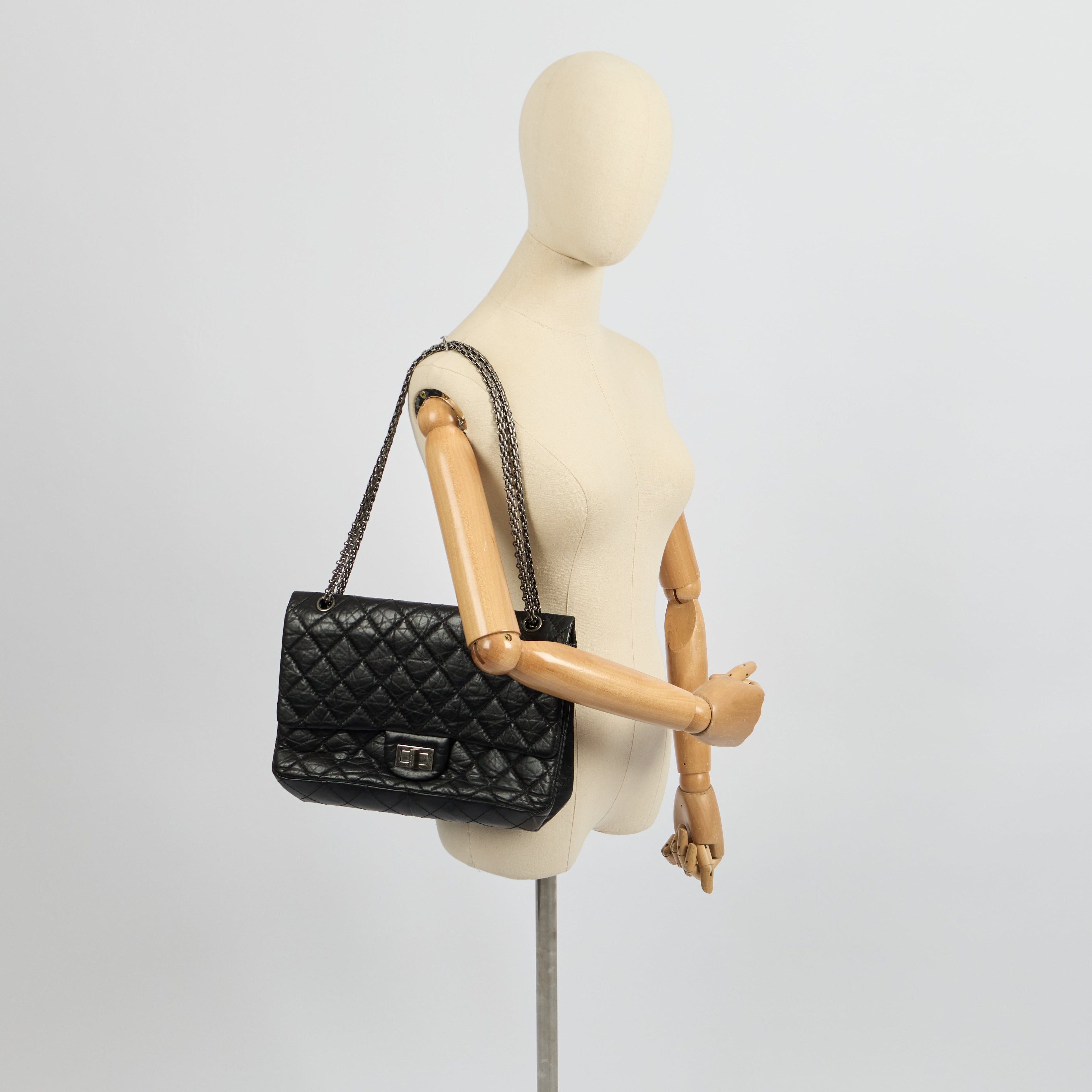 Chanel Shoulder Bag 2.55 Reissue - Medium in Black, Crinkled Calfskin Leather — Side View