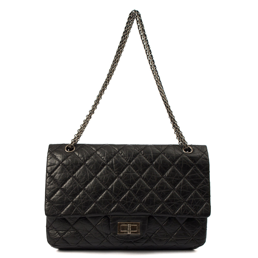 Chanel Shoulder Bag 2.55 Reissue - Medium in Black, Crinkled Calfskin Leather — Lifestyle View