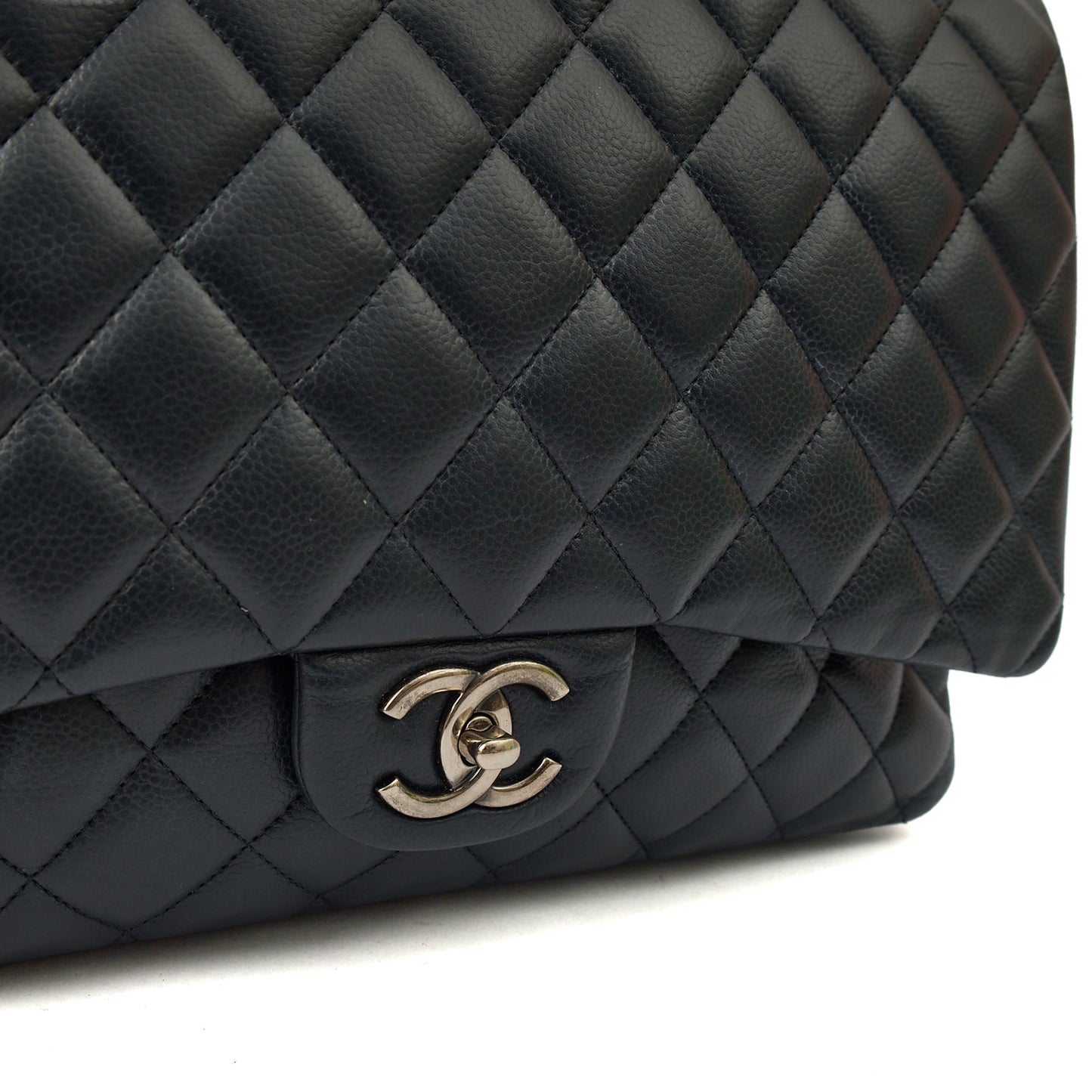 Chanel Shoulder Bag Classic - Maxi in Navy, Lambskin Leather — Lifestyle View